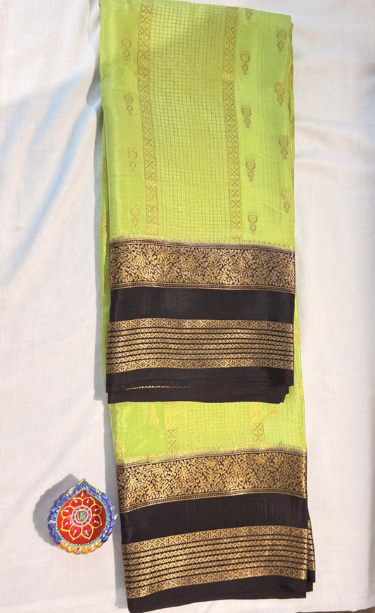 Graceful Pista Green Pure Mysore Silk Saree with Elegant Black Border